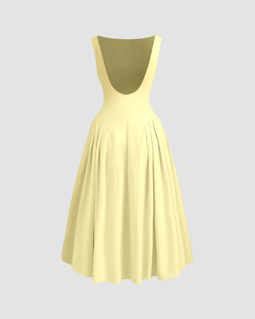A sleeveless flared midi dress in vanilla, showcasing a vibrant color and a stylish, flowing design