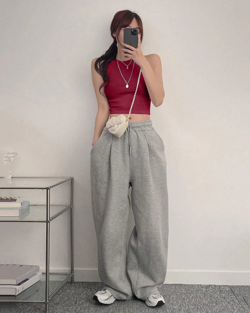 mirror selfie of maroon sleeveless crop top ribbed high neck, stylish and fitted, perfect for casual outings or layering