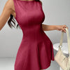 A chic maroon mini dress featuring a sleeveless design, a classic round neckline, and a flattering fit-and-flare silhouette for effortless elegance.