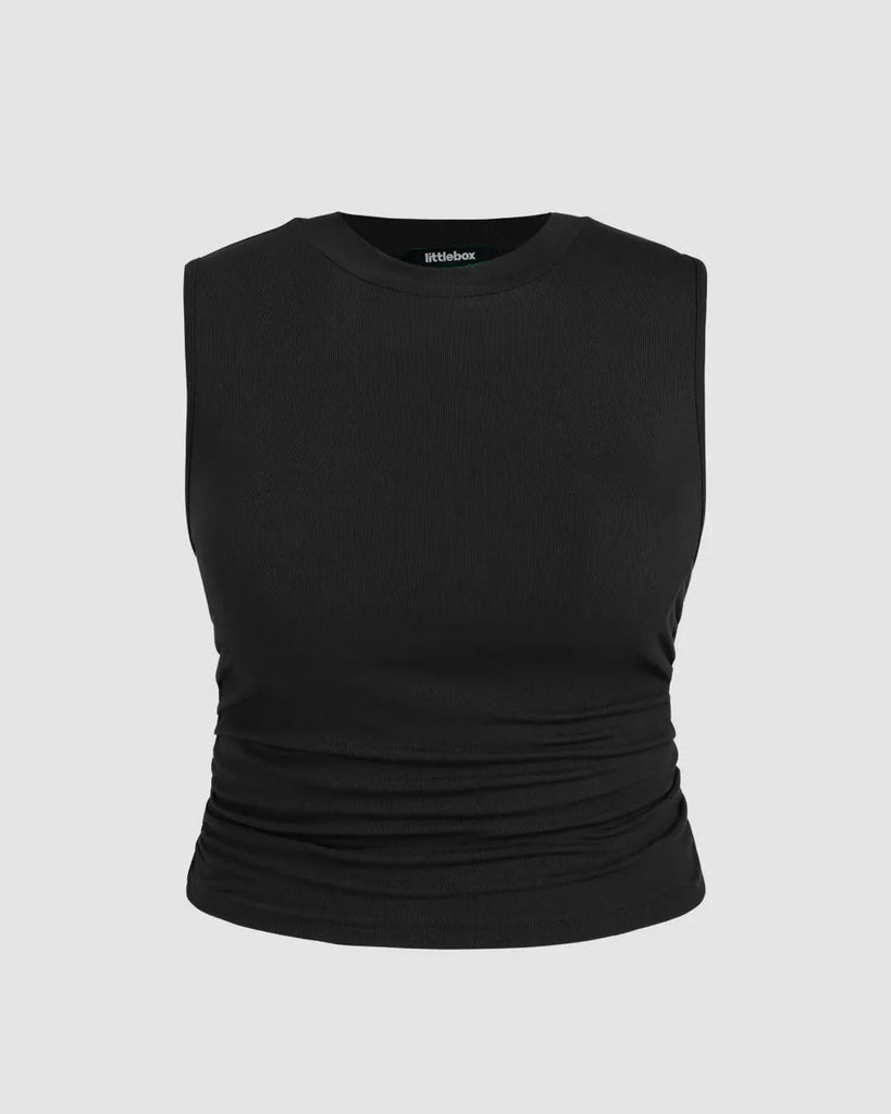 Black sleeveless crop top with ruched detailing, perfect for curve and plus sizes