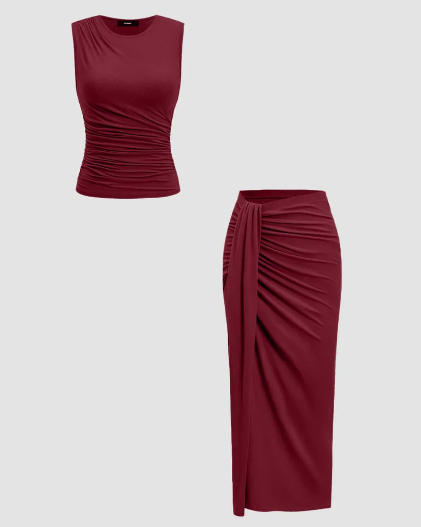 Two pieces of a maroon dress featuring a sleeveless ruched top and a matching midi skirt.