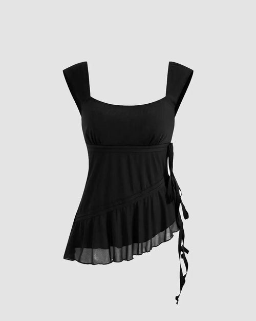 Black tank top featuring a U-neckline, asymmetrical design, and ruffled trim for a stylish look.