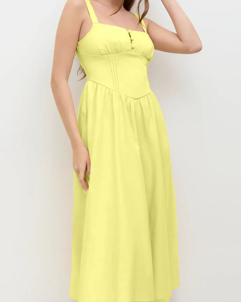 Yellow sleeveless midi dress featuring a square neckline and tie straps.