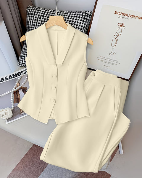 Front view of beige co-ord set with sleeveless V-neck vest top and high-waisted A-line pants, featuring a tailored fit and clean structured look