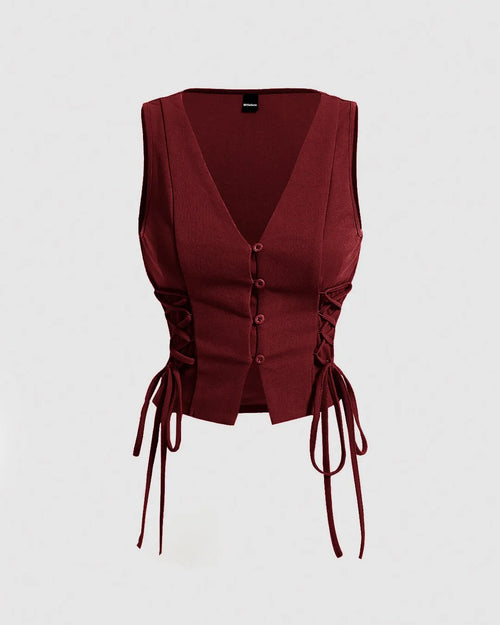 Maroon solid color crop tank top with cross tie straps and black side strap detailing for a bold, stylish look.