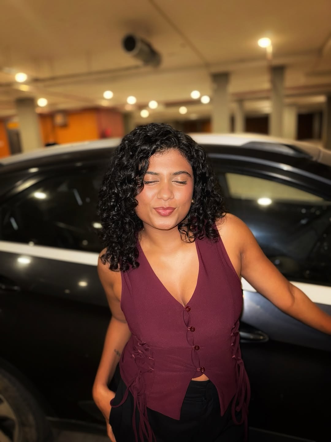 Customer photo 1 of Sleeveless V Neck Button Front Tie-Up Top in Maroon