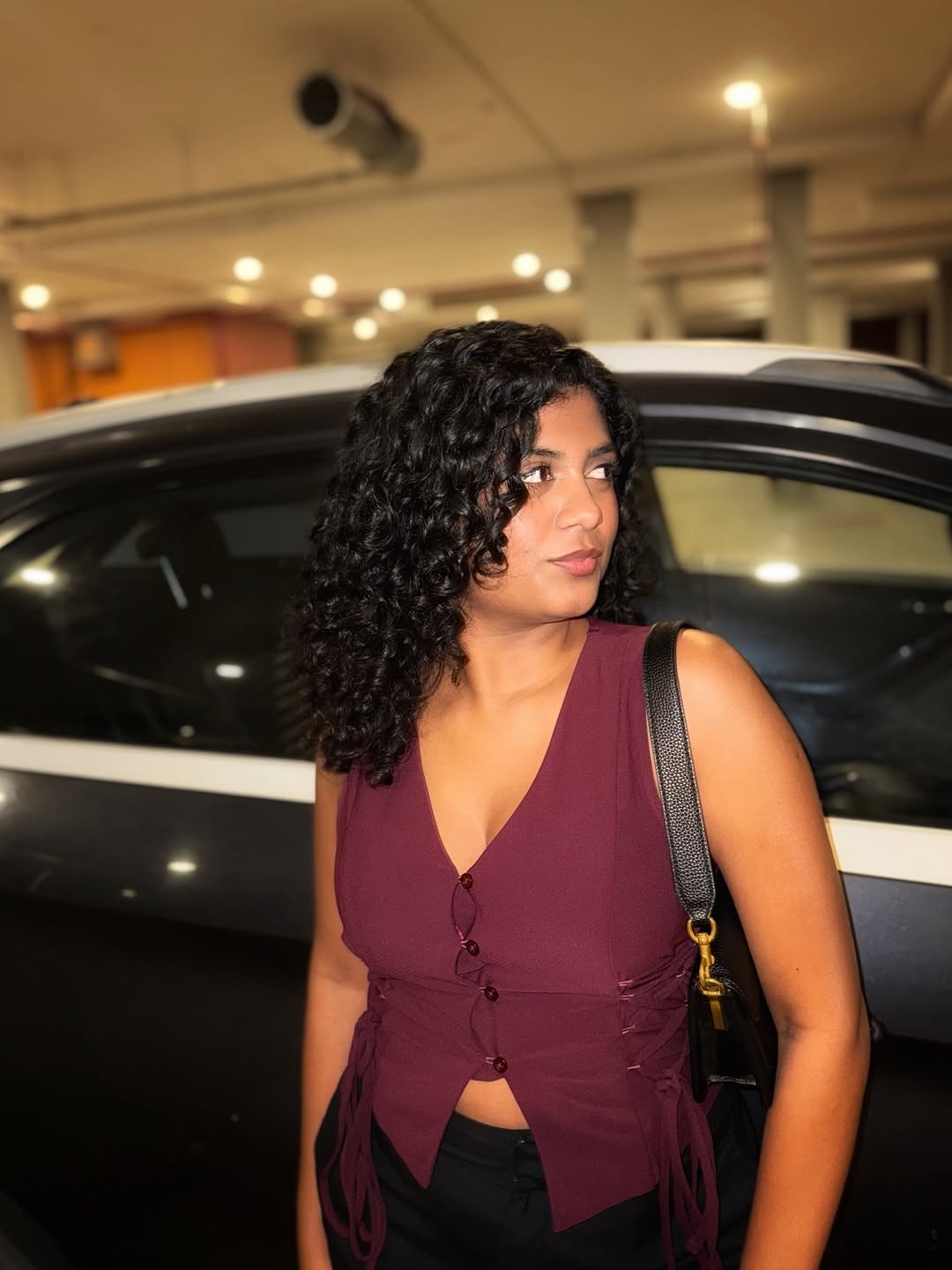 Customer photo 2 of Sleeveless V Neck Button Front Tie-Up Top in Maroon