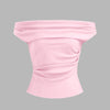Solid baby pink off-the-shoulder top with a ruched design, showcasing a stylish and feminine silhouette