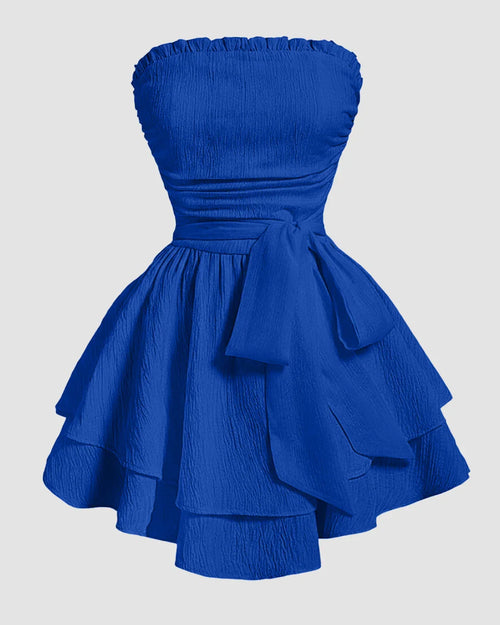 Front view of Women’s royal blue strapless dress in a solid color, featuring a waist belt and a flared layered skirt for a party-ready look.