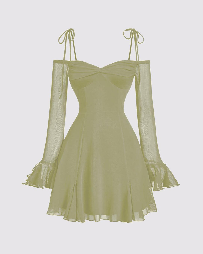 Herbal green dress with ruffles on the shoulders and a v-neck, featuring a bow tie at the waist.