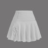A stylish skirt featuring a ruffled hem, displayed against a soft gray background