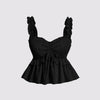 Front view of stylish black sleeveless crop top featuring ruffled shoulders and a front tie bow, perfect for a chic summer look