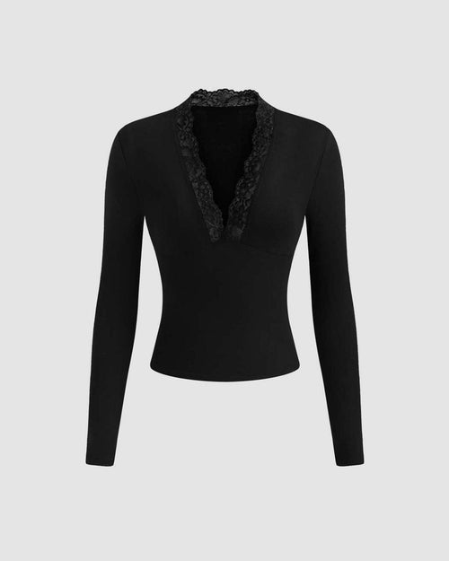 Black long sleeve top with a solid V-neck and elegant lace trim detailing.