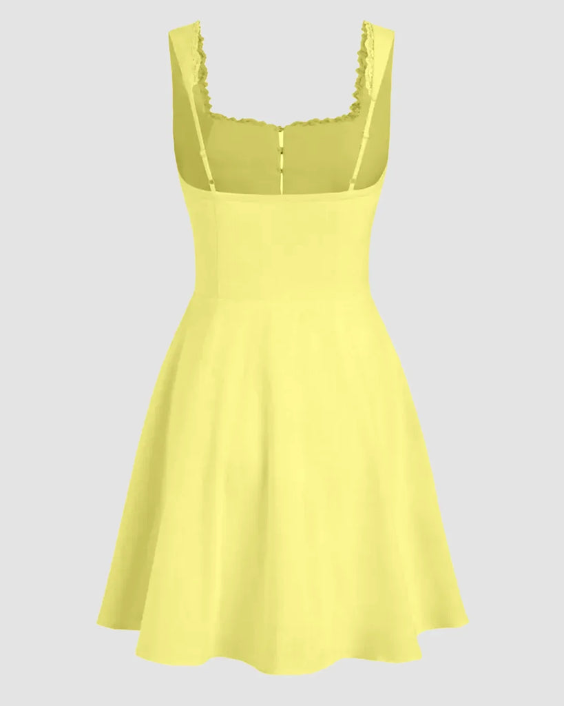 Back view of A-line mini dress in yellow featuring a square neck and straps, designed with a corset style for a flattering fit