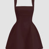 Dark brown sleeveless mini dress with a square neck and fit-and-flare design, labeled as Chocolate.