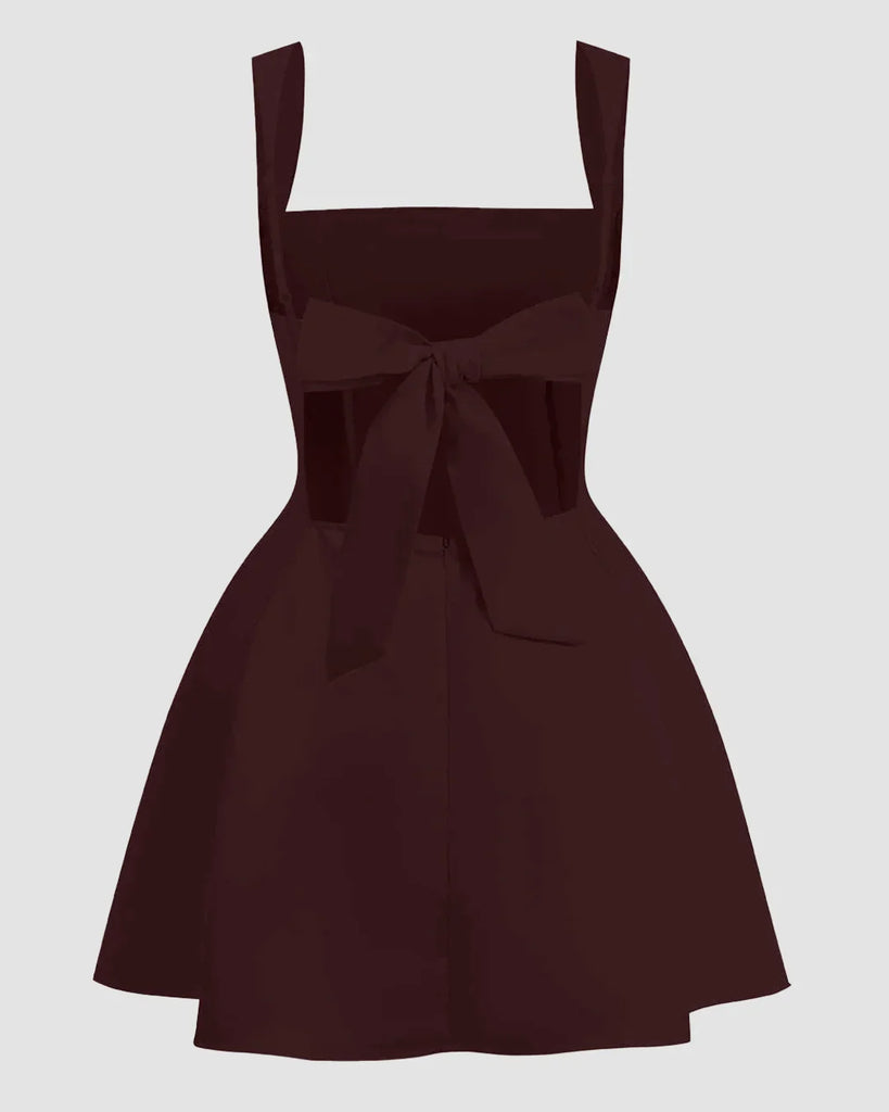 Back view of a Dark brown sleeveless mini dress with a square neck and fit-and-flare design, labeled as Chocolate.