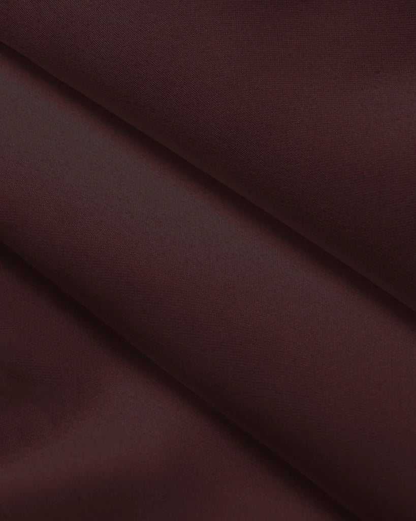 Closed view of a  Dark brown sleeveless mini dress with a square neck and fit-and-flare design, labeled as Chocolate.