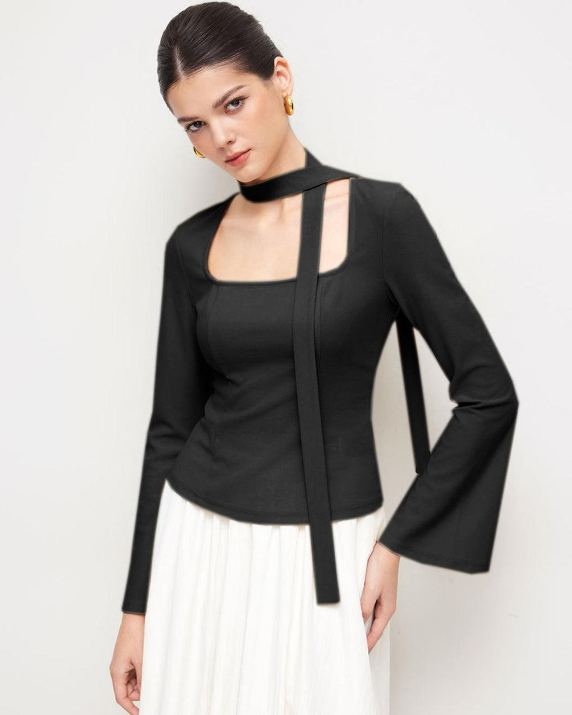 Model in Black long sleeve top with a square neck and a tie scarf detail.