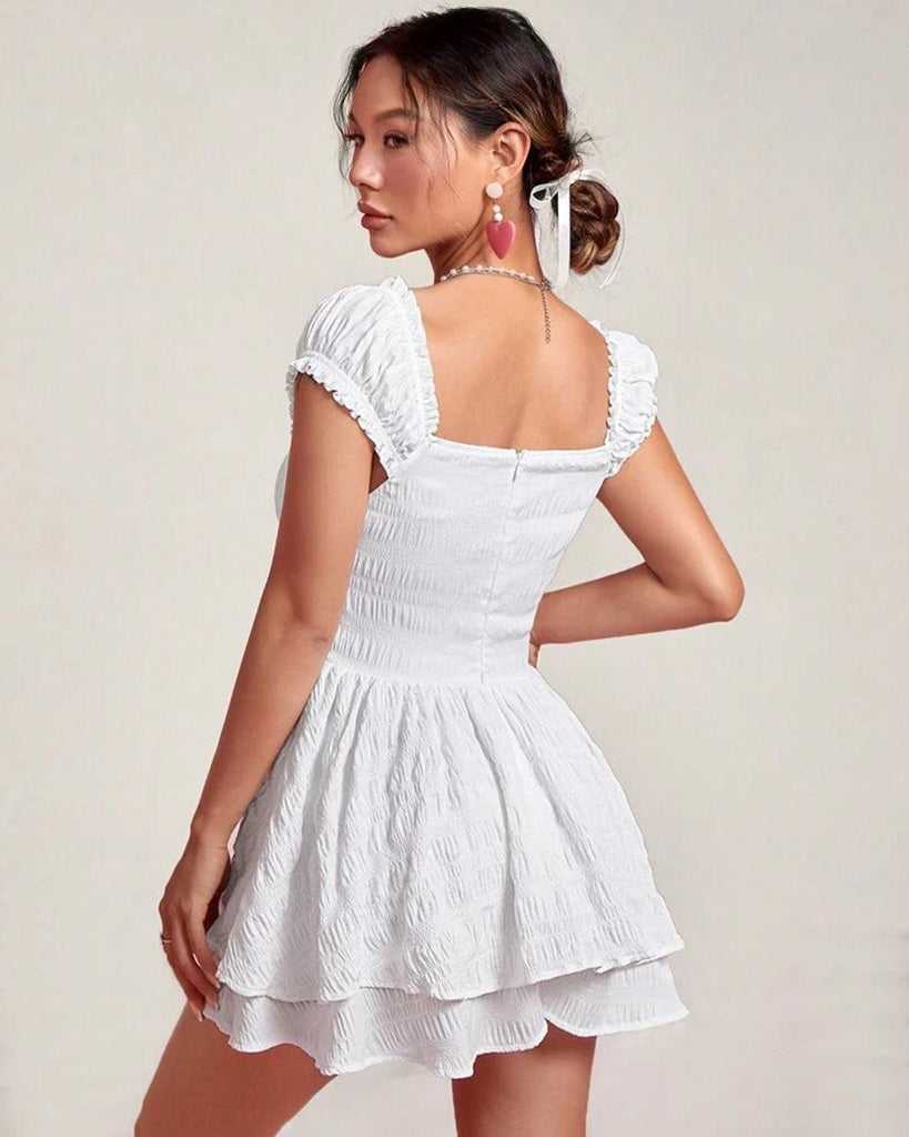 Back view of a white off shoulder double layer short sleeve dress with square neck on look perfect for summer look and casual look.