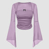 Front view of Lavender square neck long sleeve top with sheer mesh overlay, flared sleeves and small bow detail for a soft feminine look