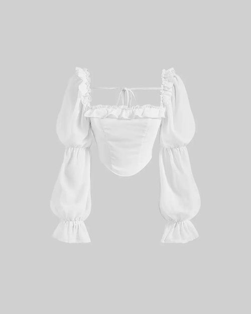 Front view of a white ruffle top with square neckline, sheer puff sleeves, ruffled trim, and tie-up detail on a white background.