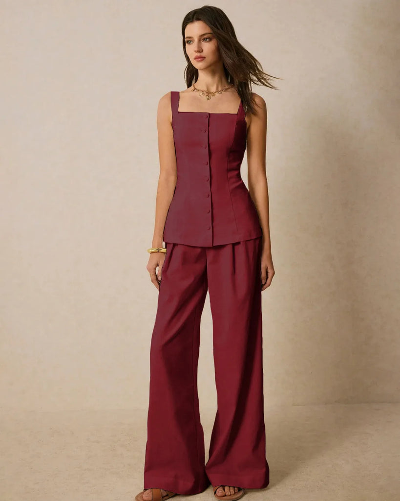 Model showcases a burgundy square neck sleeveless co-ord set with front buttons, paired with wide-legged pants.
