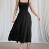 A black square neck sleeveless fit and flare midi dress, showcasing its elegant design.