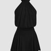 Front view of black sleeveless A-line mini dress with a stand collar and pleated skirt, featuring a flowy silhouette for a chic, elegant look