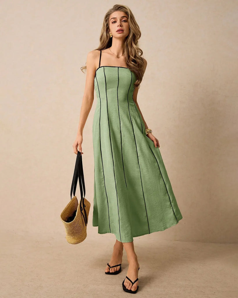 Light green midi dress featuring a strapless A-line pleated details.