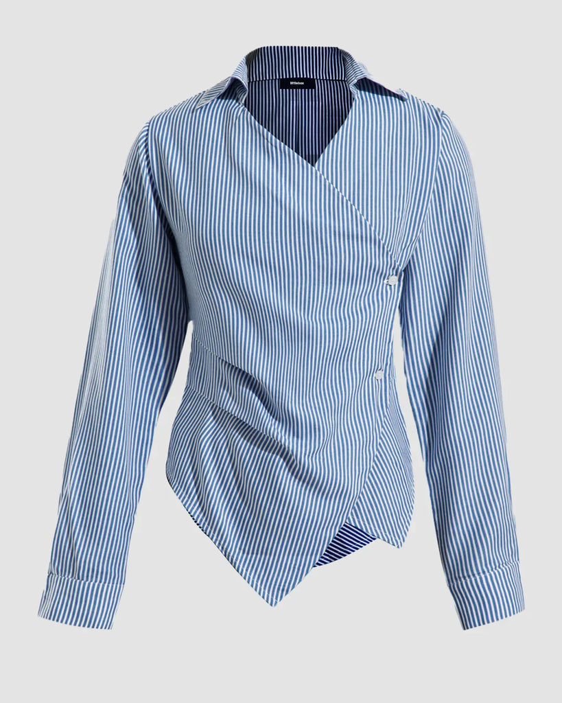 Blue and white striped asymmetrical wrap shirt with long sleeves, showcasing a stylish and modern design.