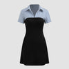 Front view of Black contrast-color mini dress with fitted skirt and blue-and-white striped collared top with short sleeves, shown front and back.