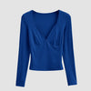 A stylish Surf Blue V-Neck Long Sleeve Top with a deep neckline, designed to enhance curves and add a pop of color.