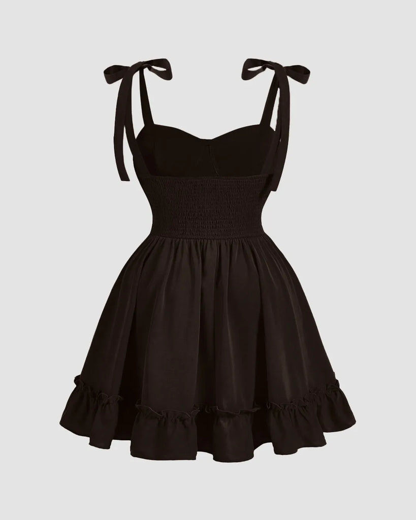 Back view of a Chocolate-hued sweetheart-neck dress featuring a lace-up waist for a romantic, sculpted silhouette.