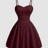 Burgundy sweetheart neck fit and flare mini dress with spaghetti straps, showcasing a stylish and elegant design.