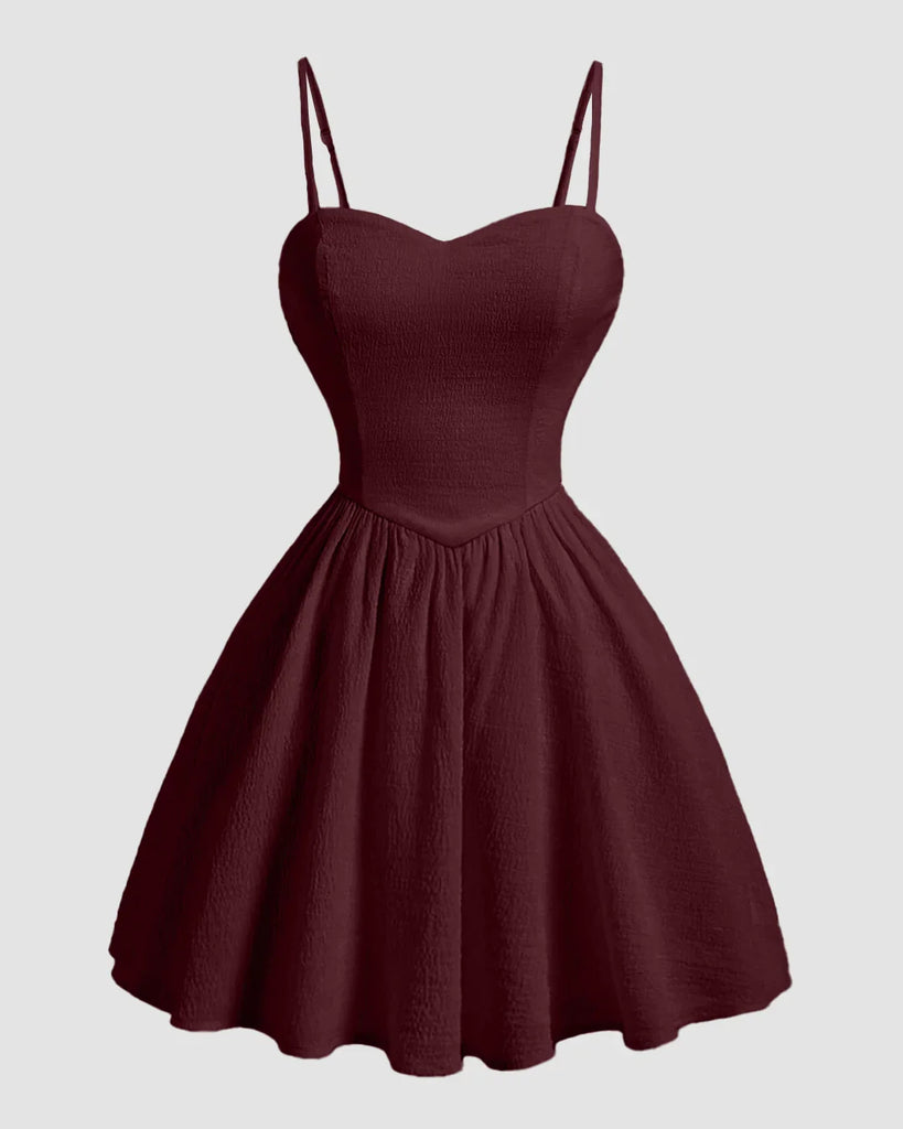 Burgundy sweetheart neck fit and flare mini dress with spaghetti straps, showcasing a stylish and elegant design.