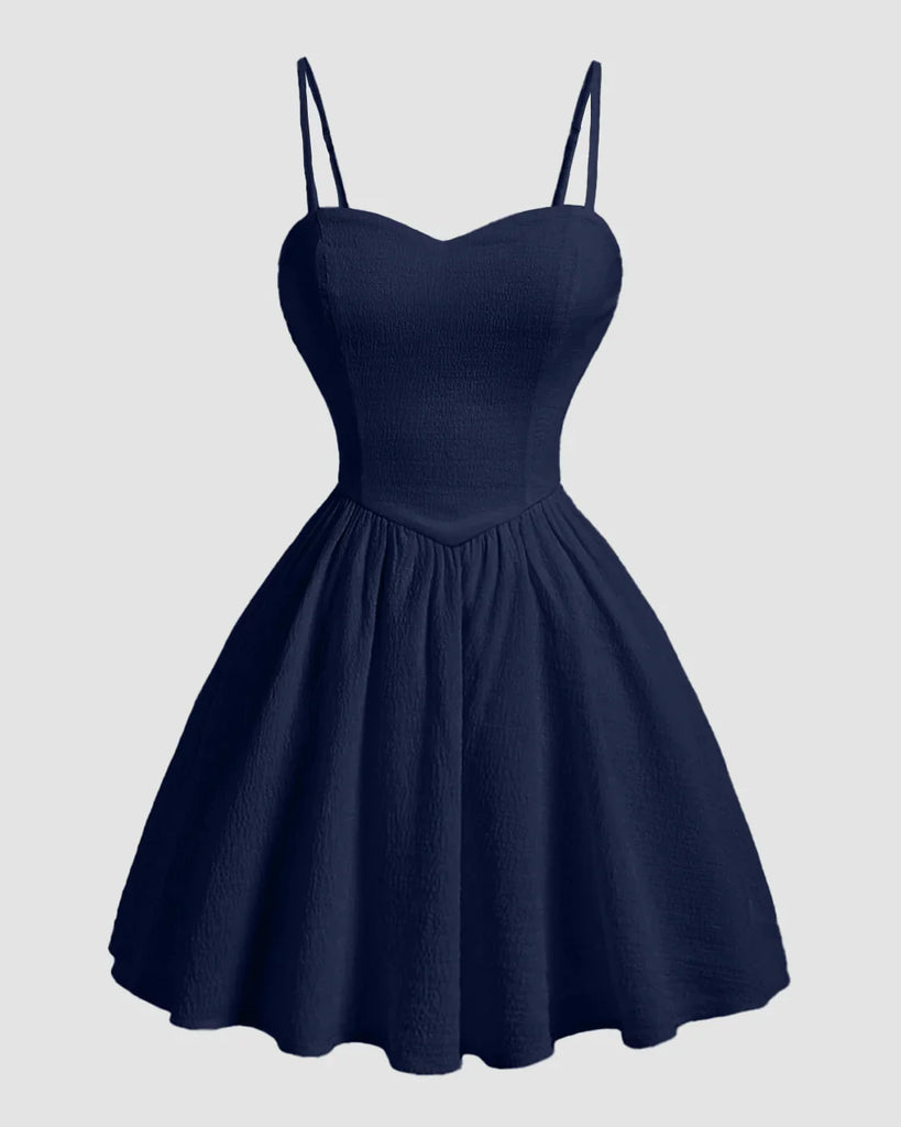 Navy blue sweetheart neck fit and flare sleeveless mini dress with spaghetti straps.