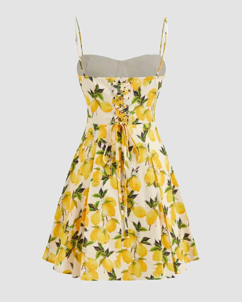 A-line dress featuring a sweetheart neckline with a vibrant lemon print design.