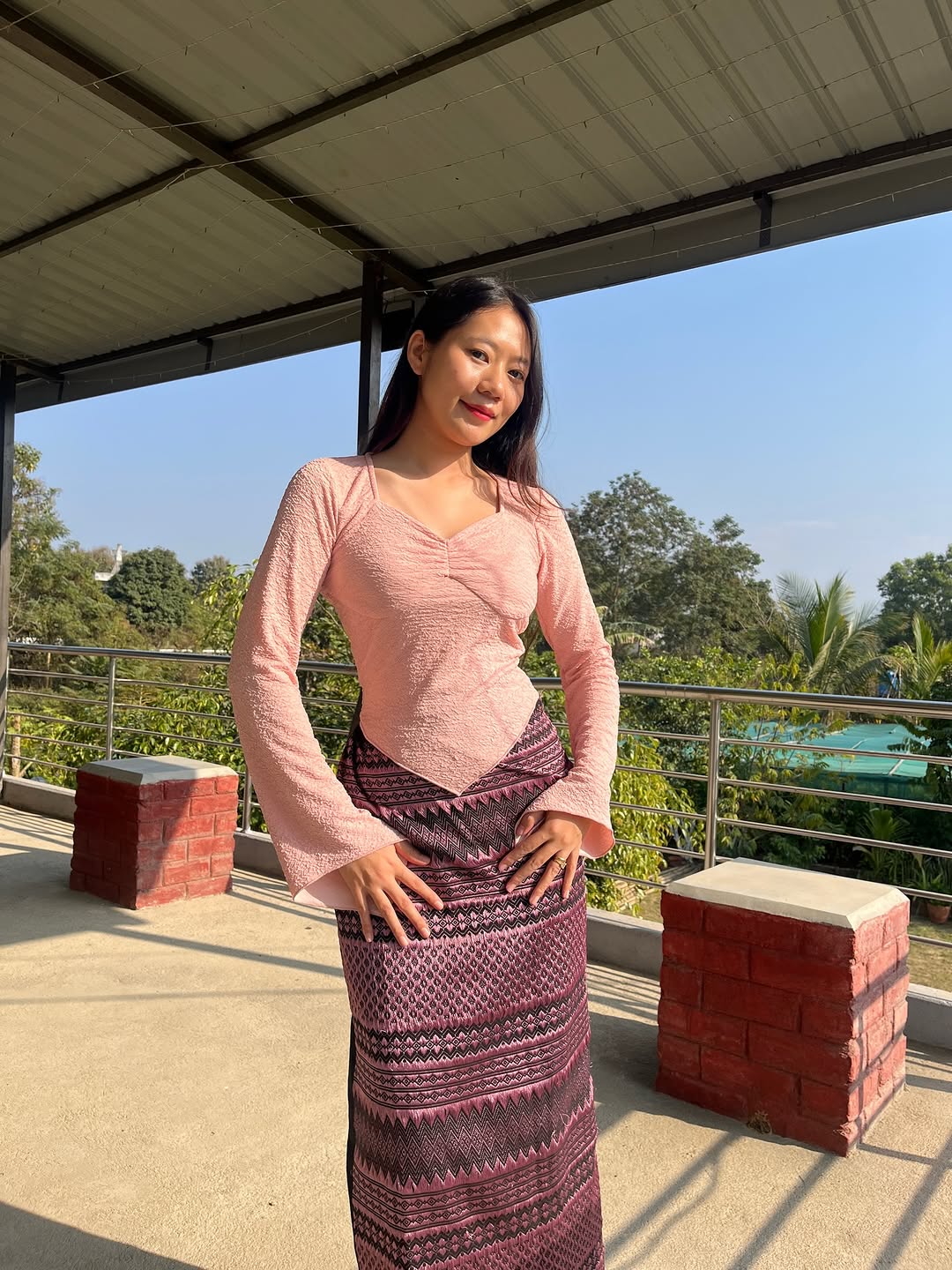 Customer photo 1 of Sweetheart Neck Ruched Flared Long Sleeve Top in Pink