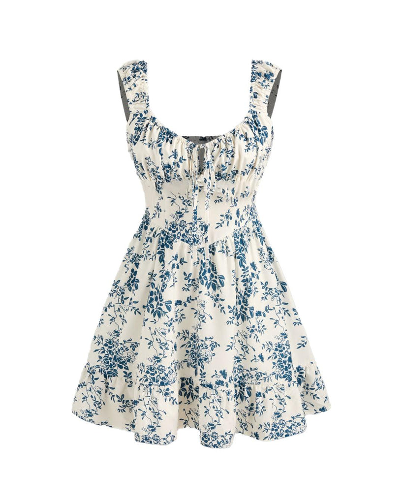 blue and white floral dress featuring a ruffled sweetheart neckline