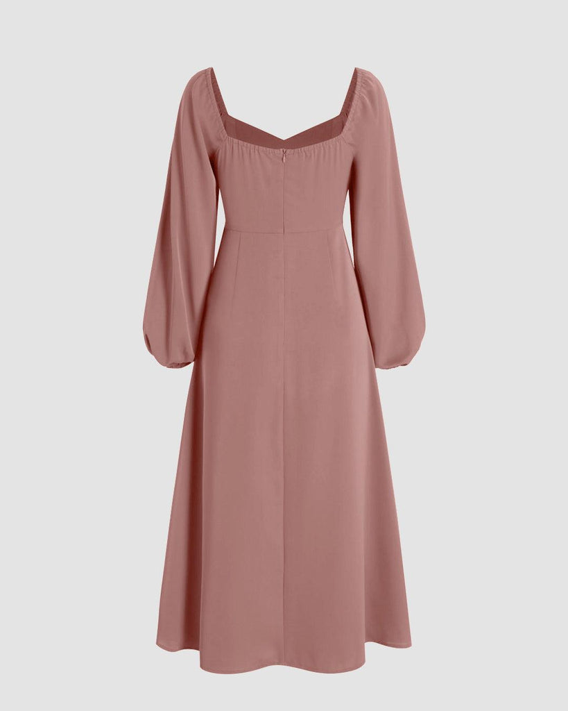Back view of a peach-toned dress featuring a sweetheart neckline and peasant-style sleeves for a soft, romantic look.