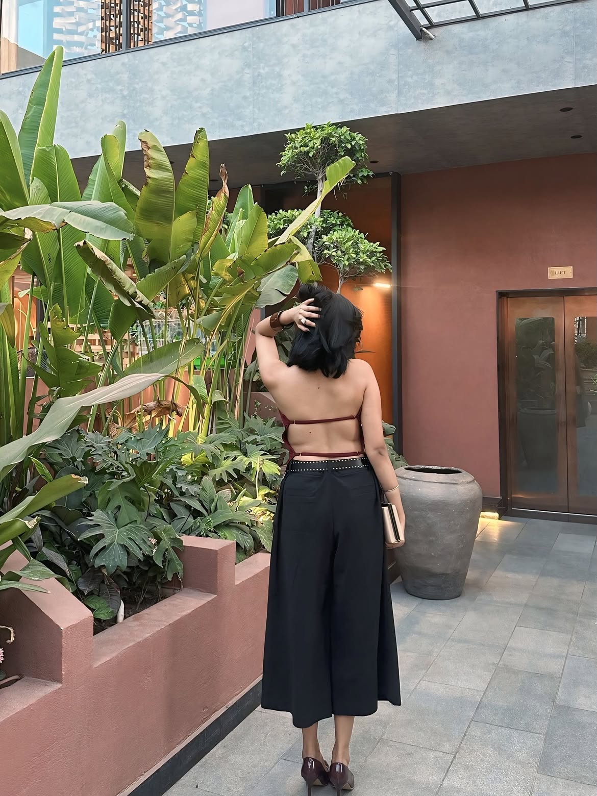 Customer photo 1 of Halter Neck Slim-Fit Straight Hem Solid Sleeveless Crop Top in Maroon