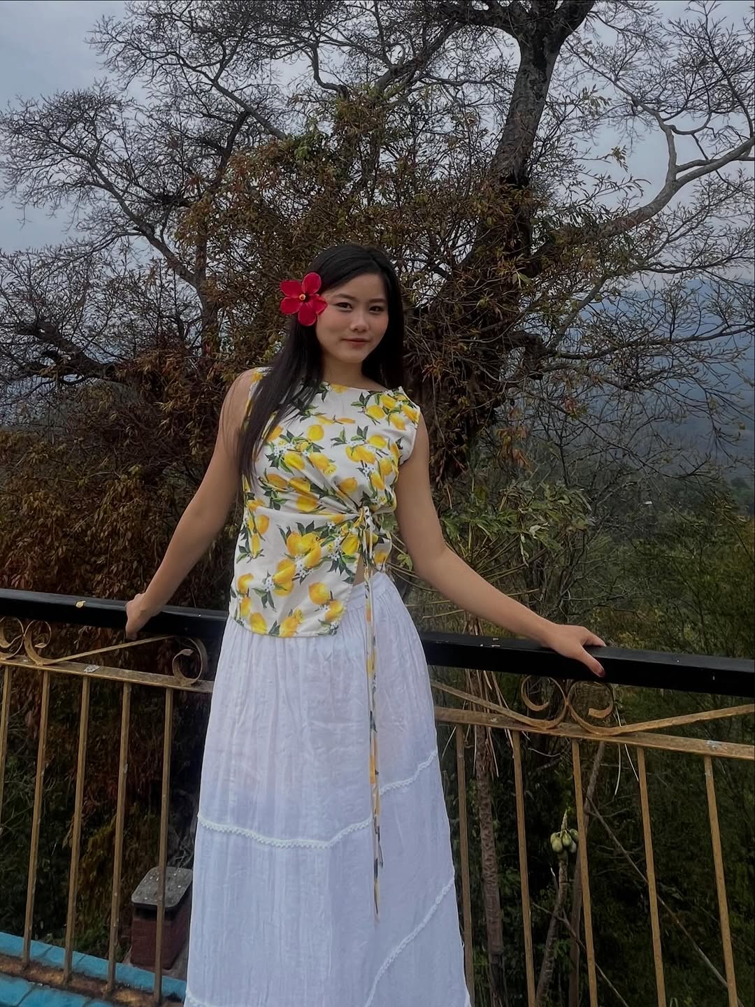 Customer photo 2 of Floral Asymmetrical Ruched Side Tie Sleeveless Top in Yellow