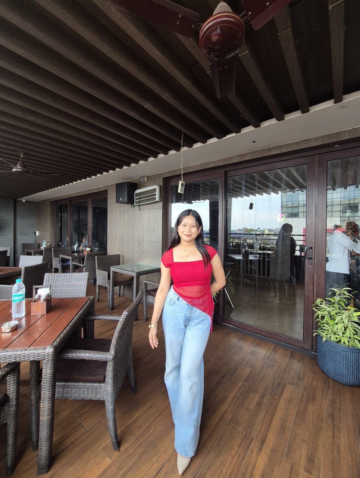 Customer photo 2 of Tie Front Asymmetrical Hem Sleeveless Top in Dark Red