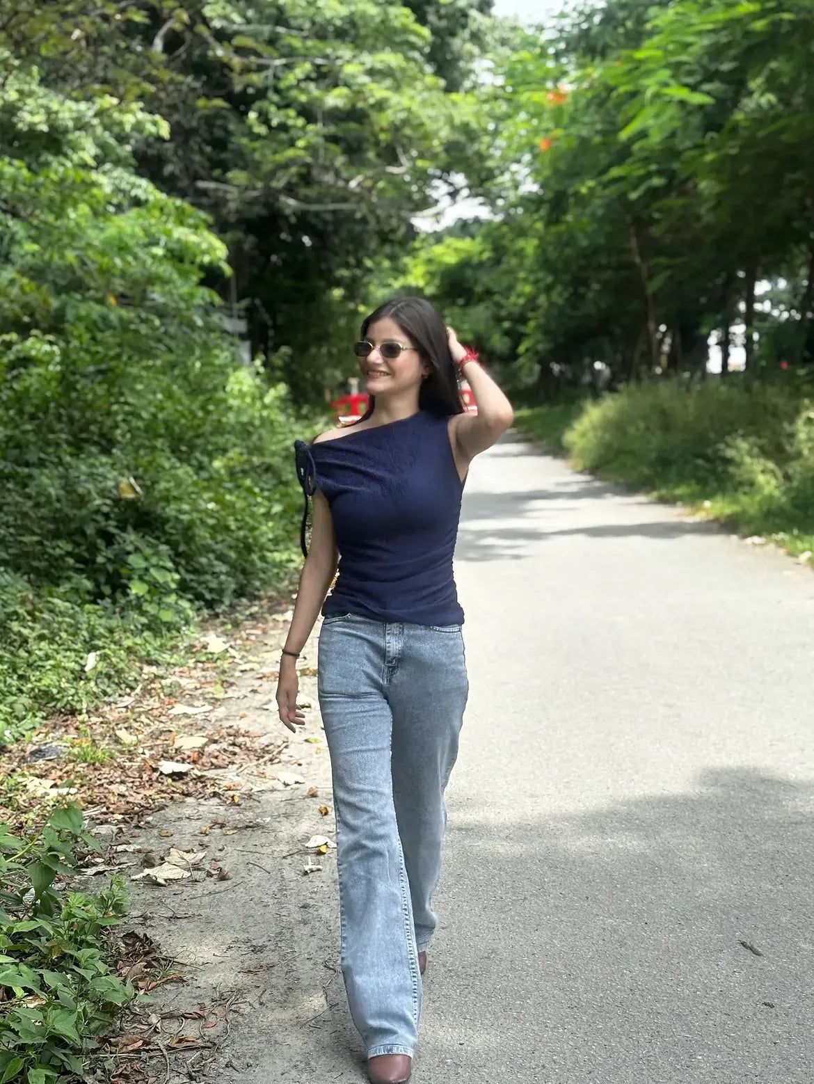Customer photo 1 of Asymmetrical Side Knot Sleeveless Top in Blue