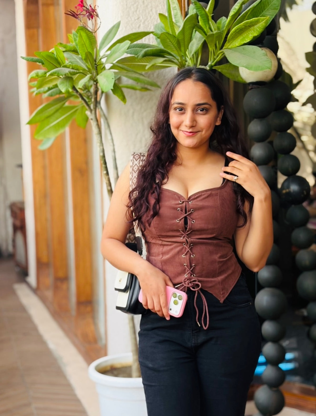 Customer photo 3 of Sleeveless Corset Asymmetrical Hem Fitted Top in Brown