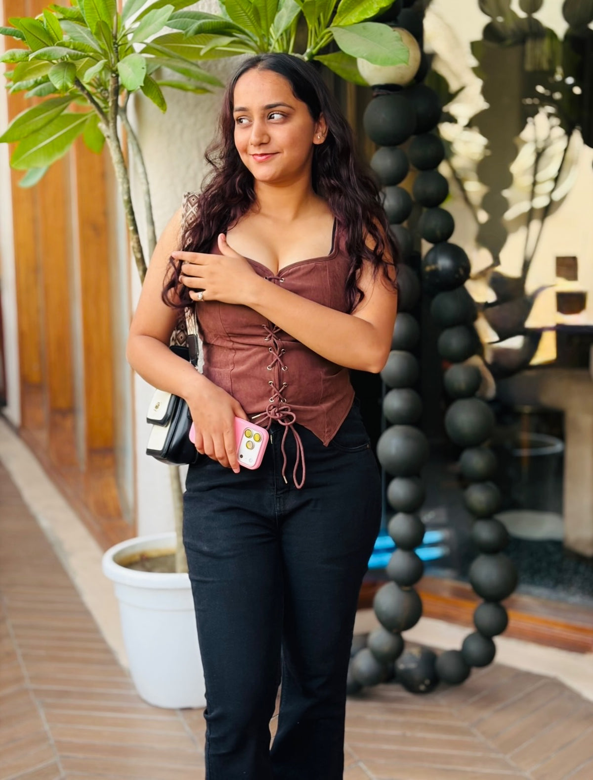 Customer photo 2 of Sleeveless Corset Asymmetrical Hem Fitted Top in Brown