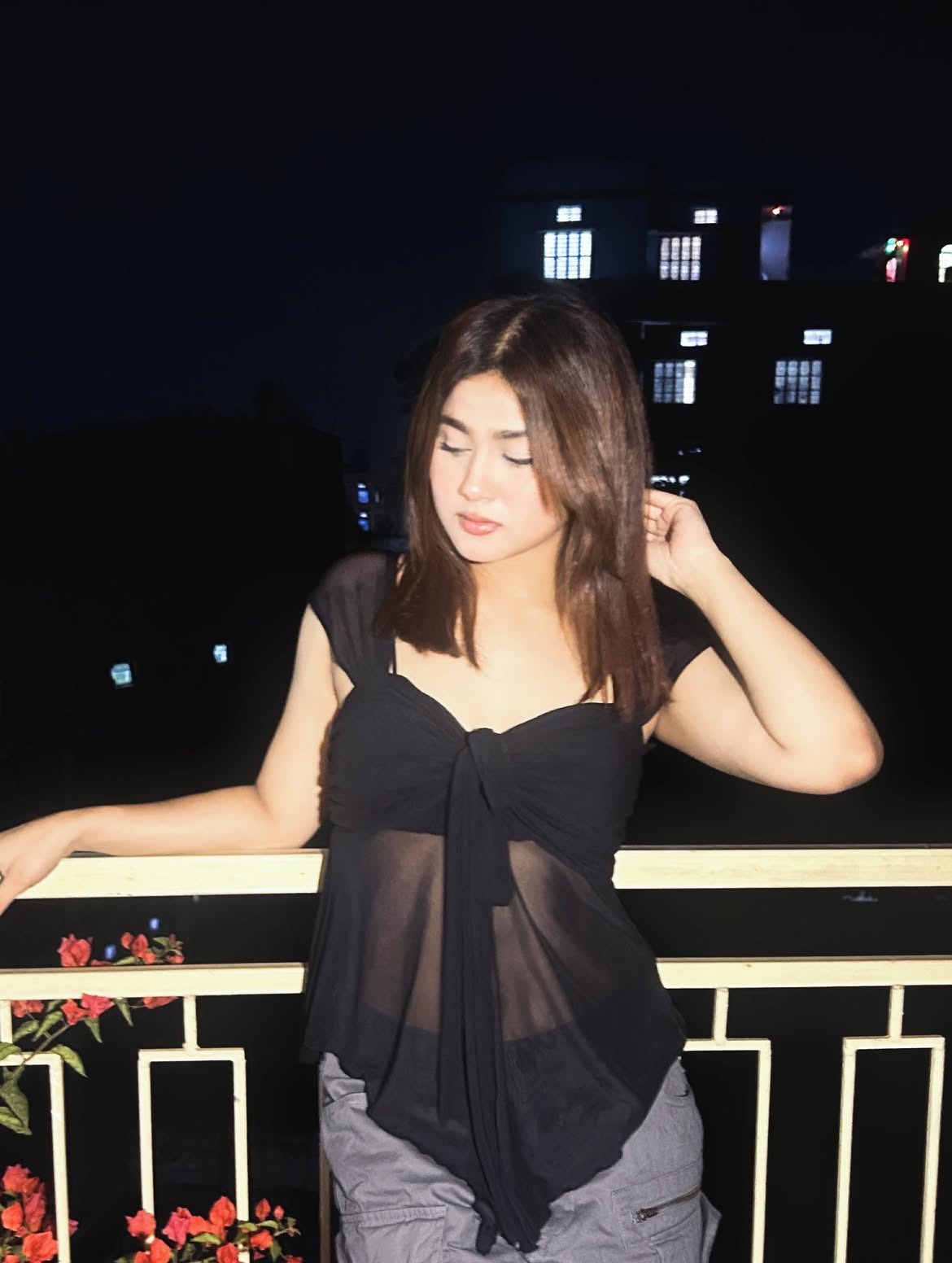 Customer photo 1 of Sleeveless Tie Front Pleated Ruffle Top in Black