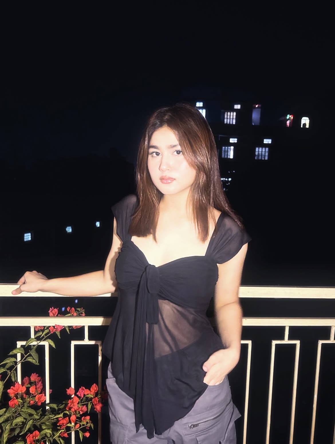 Customer photo 3 of Sleeveless Tie Front Pleated Ruffle Top in Black