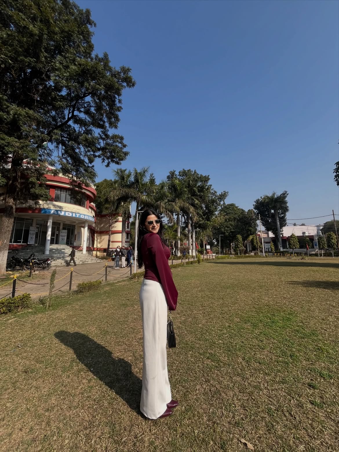 Customer photo 1 of Party Ribbed Twist Front Long Sleeve Top in Maroon