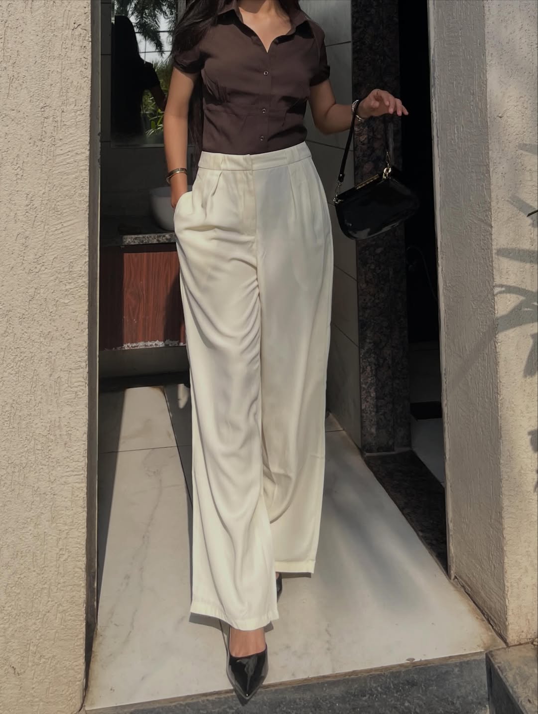 Customer photo 1 of Pleated High Waisted Wide Leg Trousers in Off-White